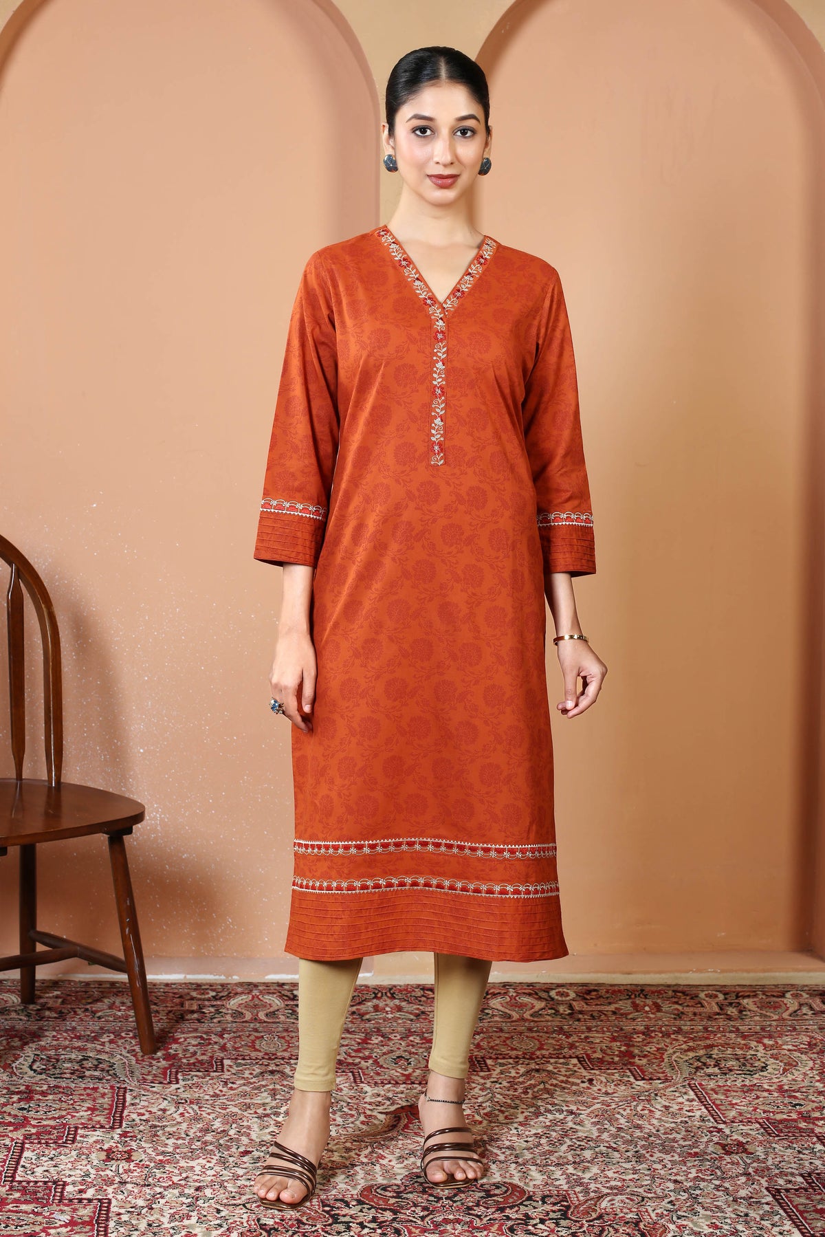 Rust Pure Cotton Printed Kurta with Embroidered Neckline