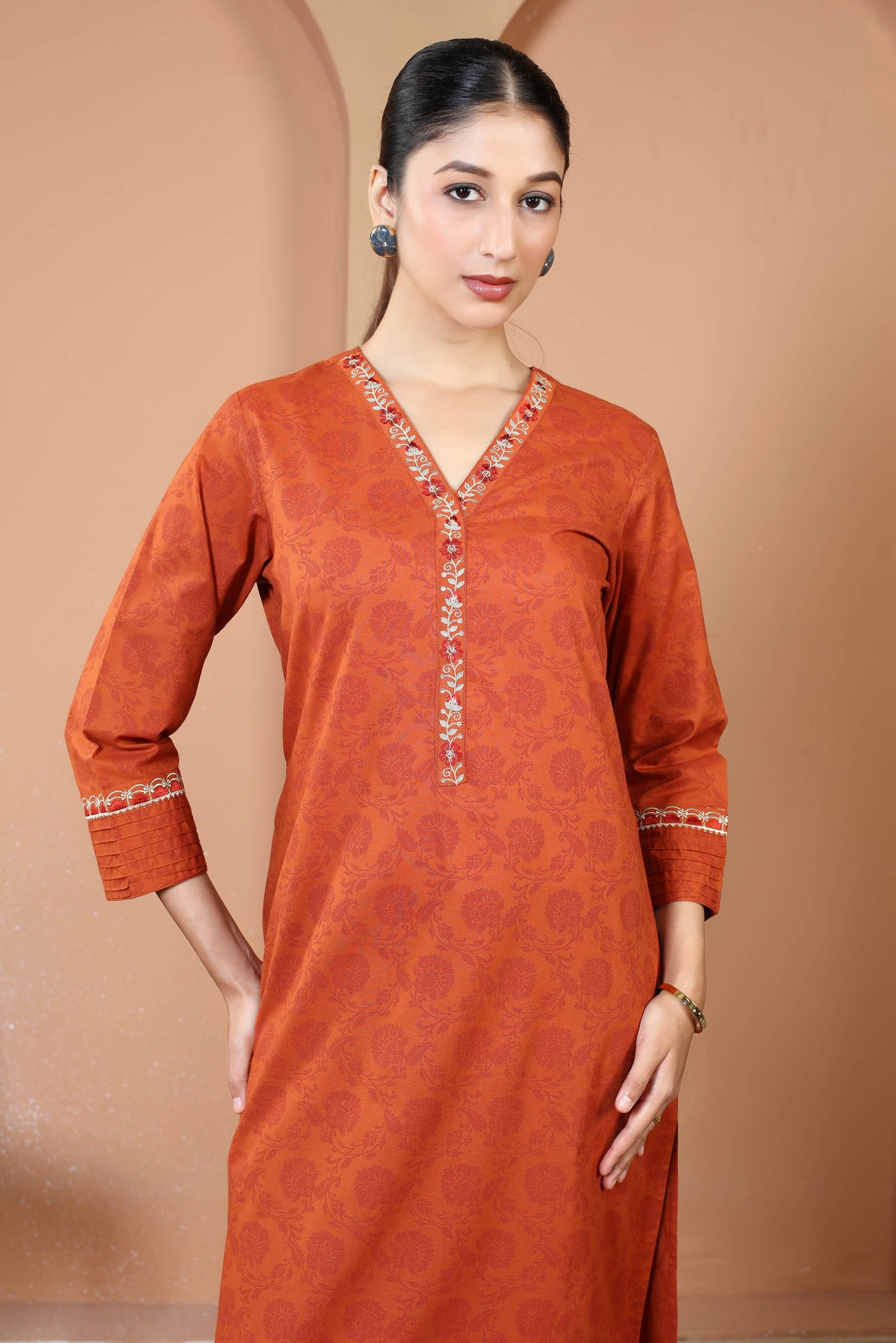 Rust Pure Cotton Printed Kurta with Embroidered Neckline