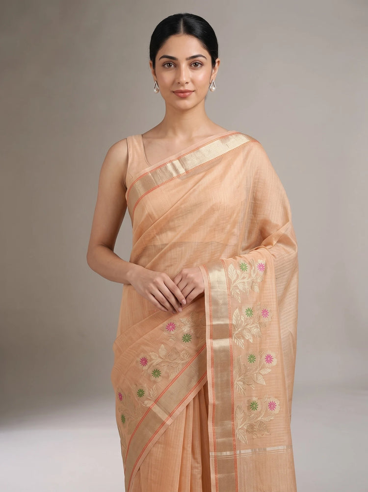 Close-up front view of orange Kota tissue woven border saree highlighting the fabric texture and intricate woven border