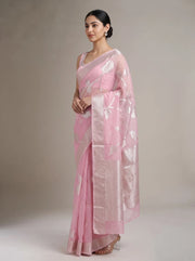 Side view of elegant pink cotton woven saree showing the graceful drape, woven pattern and decorative border