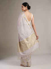 Back view of lilac purple cotton zari stripe saree showing the blouse, striped drape and golden zari detailing