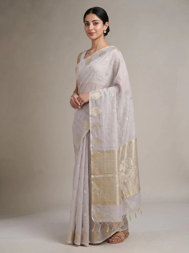 Side view of lilac purple cotton zari stripe saree showing the graceful drape, zari stripes and decorative border