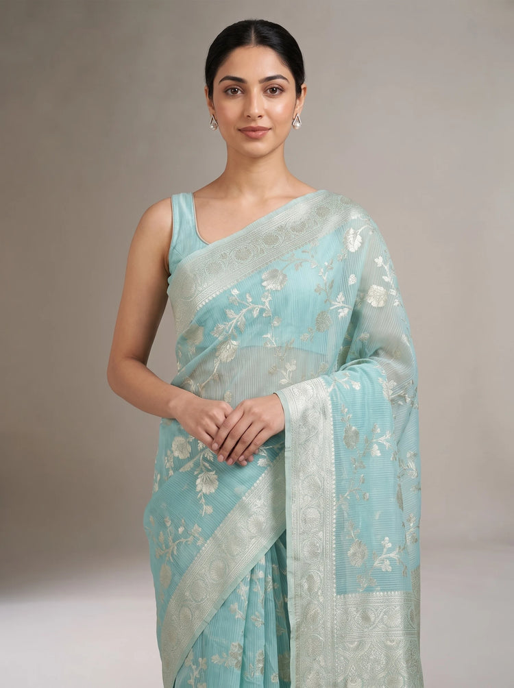 Close-up front view of the sky blue Saffee cotton woven saree showcasing its woven texture
