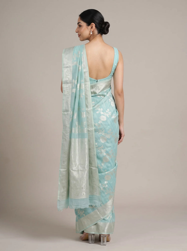 Back view of the sky blue Saffee cotton woven saree showing the overall drape