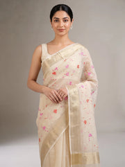 Close-up front view of cream Munga Kota cotton Banarasi embroidered saree showing intricate floral embroidery and Banarasi detailing