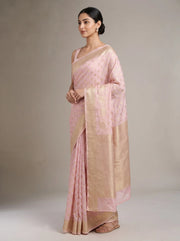 Side view of baby pink Chanderi cotton saree showing the flowing drape, delicate woven pattern and decorative border