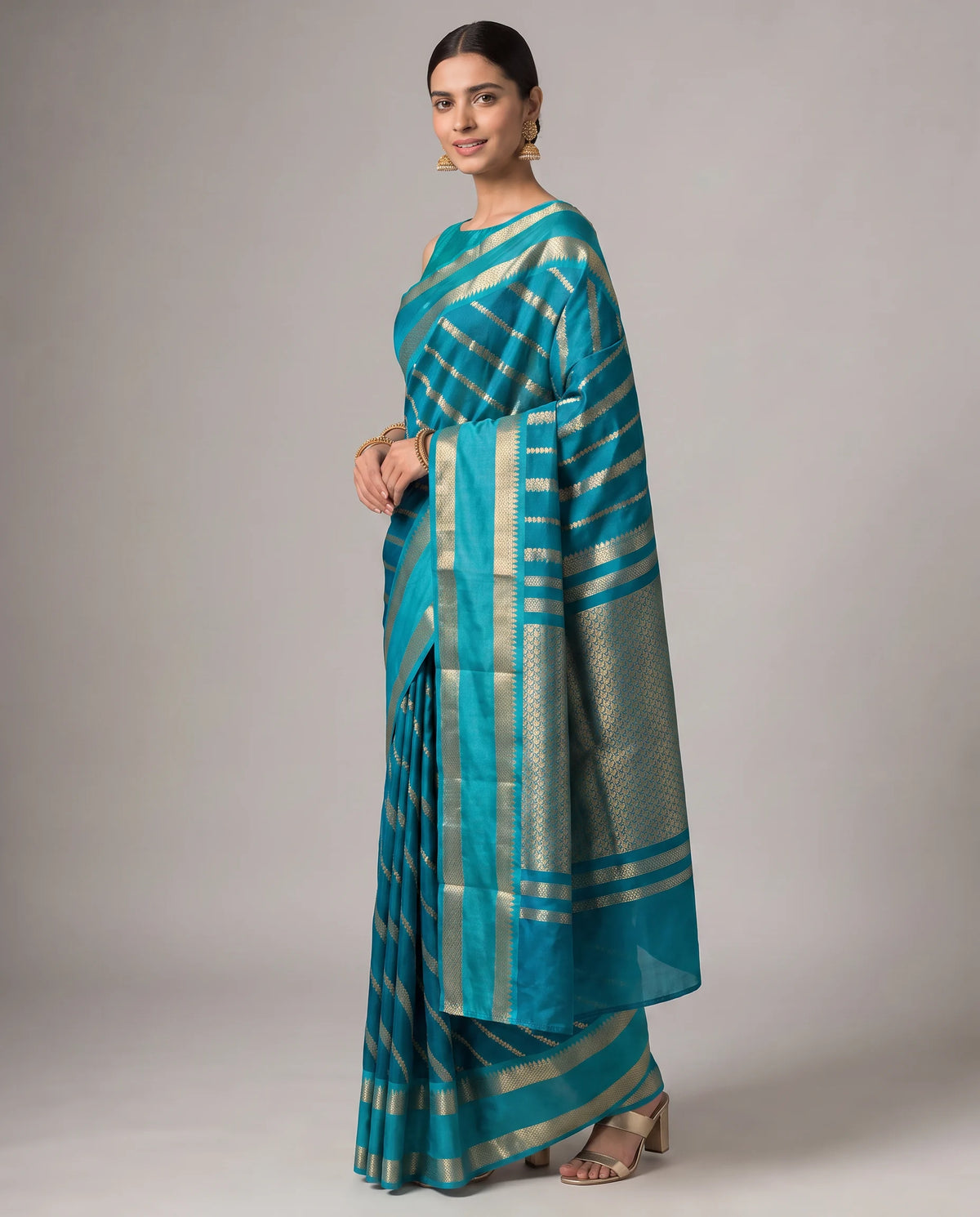 Teal Fancy Silk Zari Strip Saree