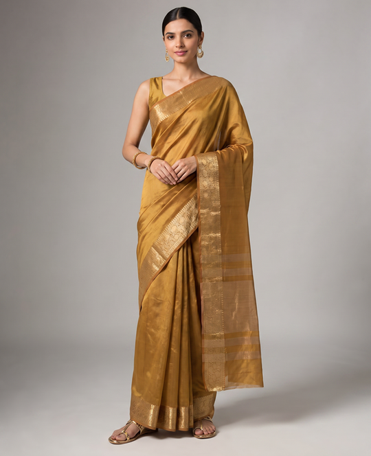 Gold Orange Tissue Fancy Saree with Elegant Golden Woven Floral Design