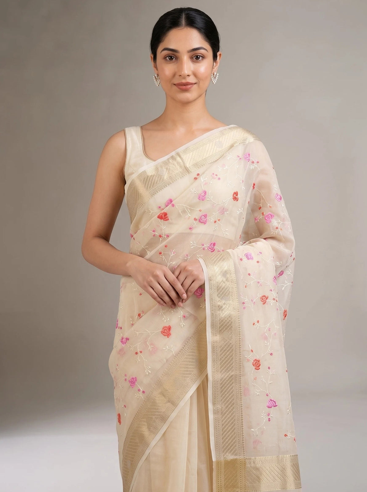 Close-up front view of cream Munga Kota cotton Banarasi embroidered saree showing intricate floral embroidery and Banarasi detailing