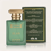 A green glass bottle of ELAN Cotton Culture Eau de Parfum with a gold cap, shown alongside its dark green and gold retail box on a light background.